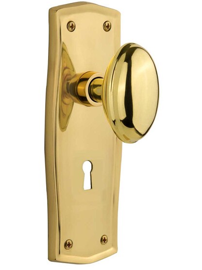 Prairie Design Mortise Lock Set With Oval Brass Knobs in Un-Lacquered Brass.